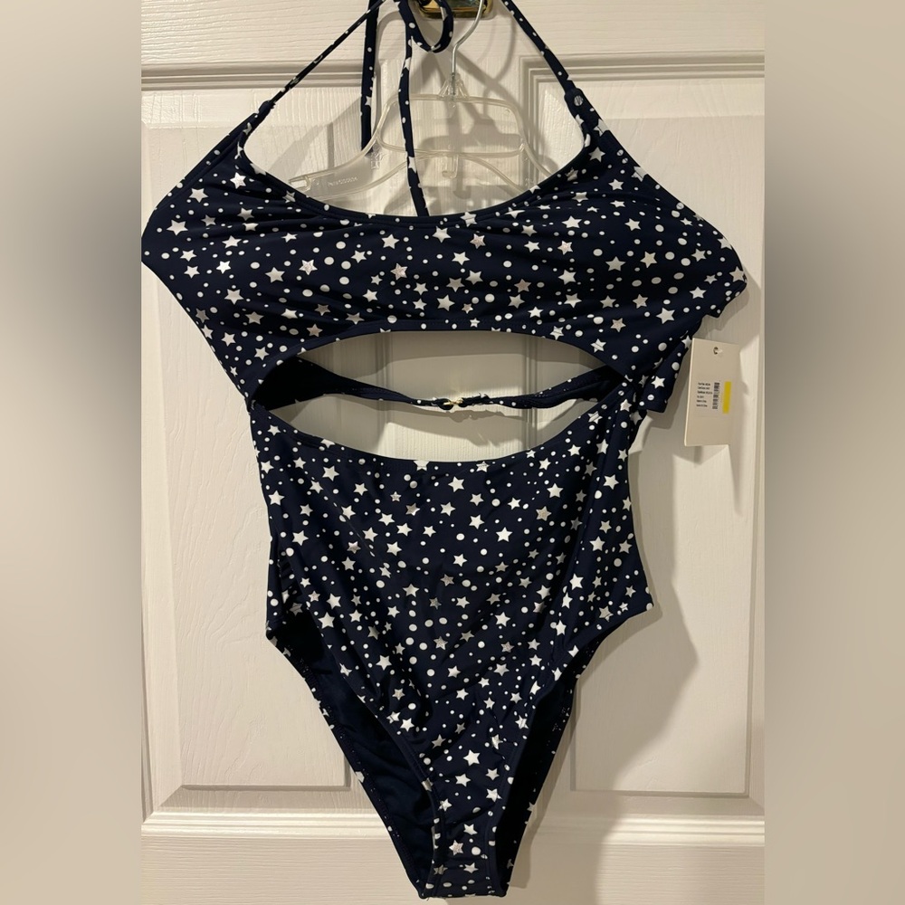 Navy blue one piece attached swimsuit with white stars.